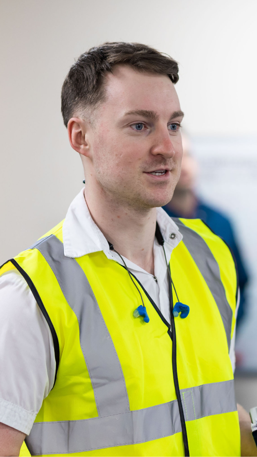 Man in a yellow safety vest